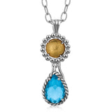 18K Yellow Gold and Sterling Silver Pendant with Teardrop Blue Topaz Accent