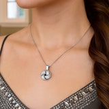 Sterling Silver Pendant with a Ridge Textured Love Knot Design