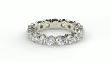 Round Cut Lab Grown Diamond Eternity Ring in 14k White Gold (3 cttw FG/VS2)