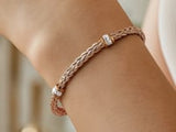 Polished Woven Rope Bracelet with Diamond Accents in 14k Rose Gold